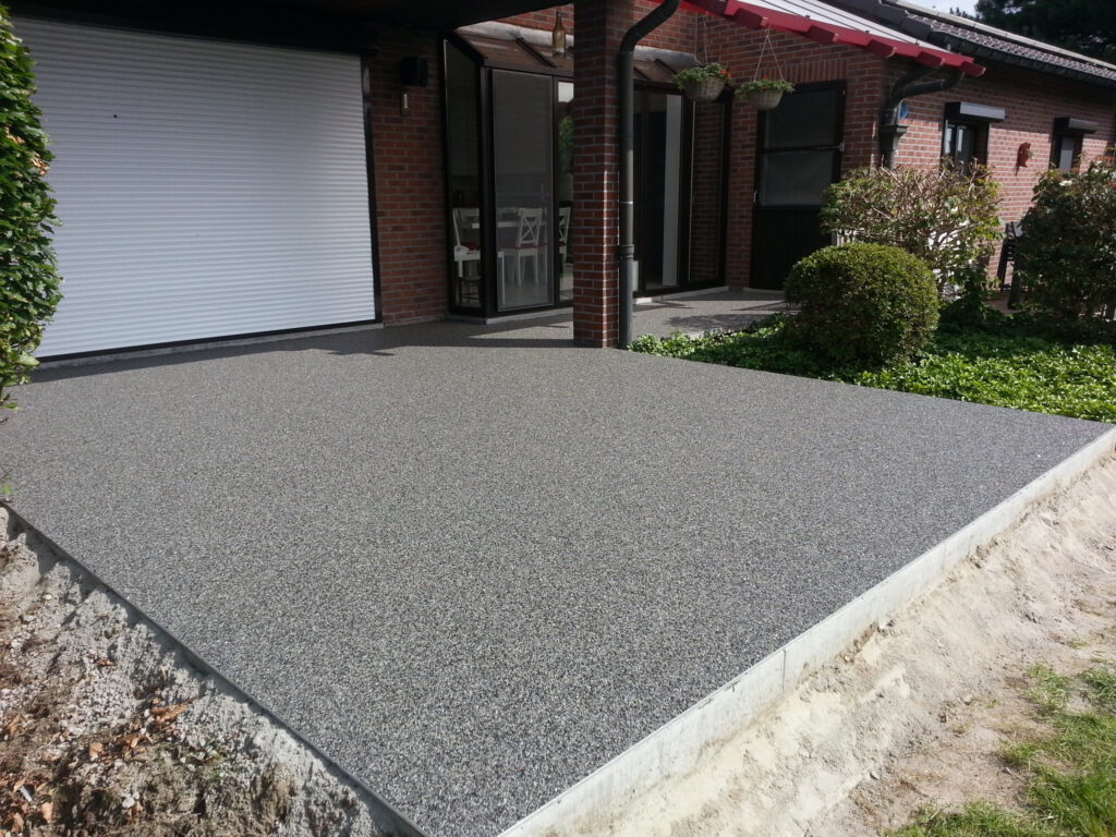steentapijt laten leggen, laten plaatsen van steentapijt